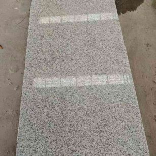 池州芝麻白光面毛板